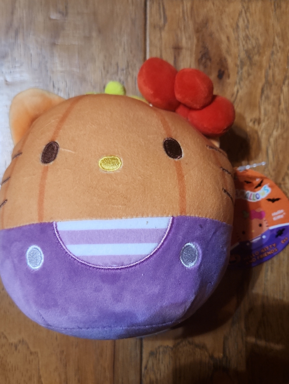 Sanrio Hello Kitty Orange Plush with Purple Outfit and Red Bow